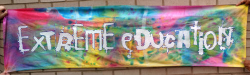 Fabric banner with Extreme Education logo